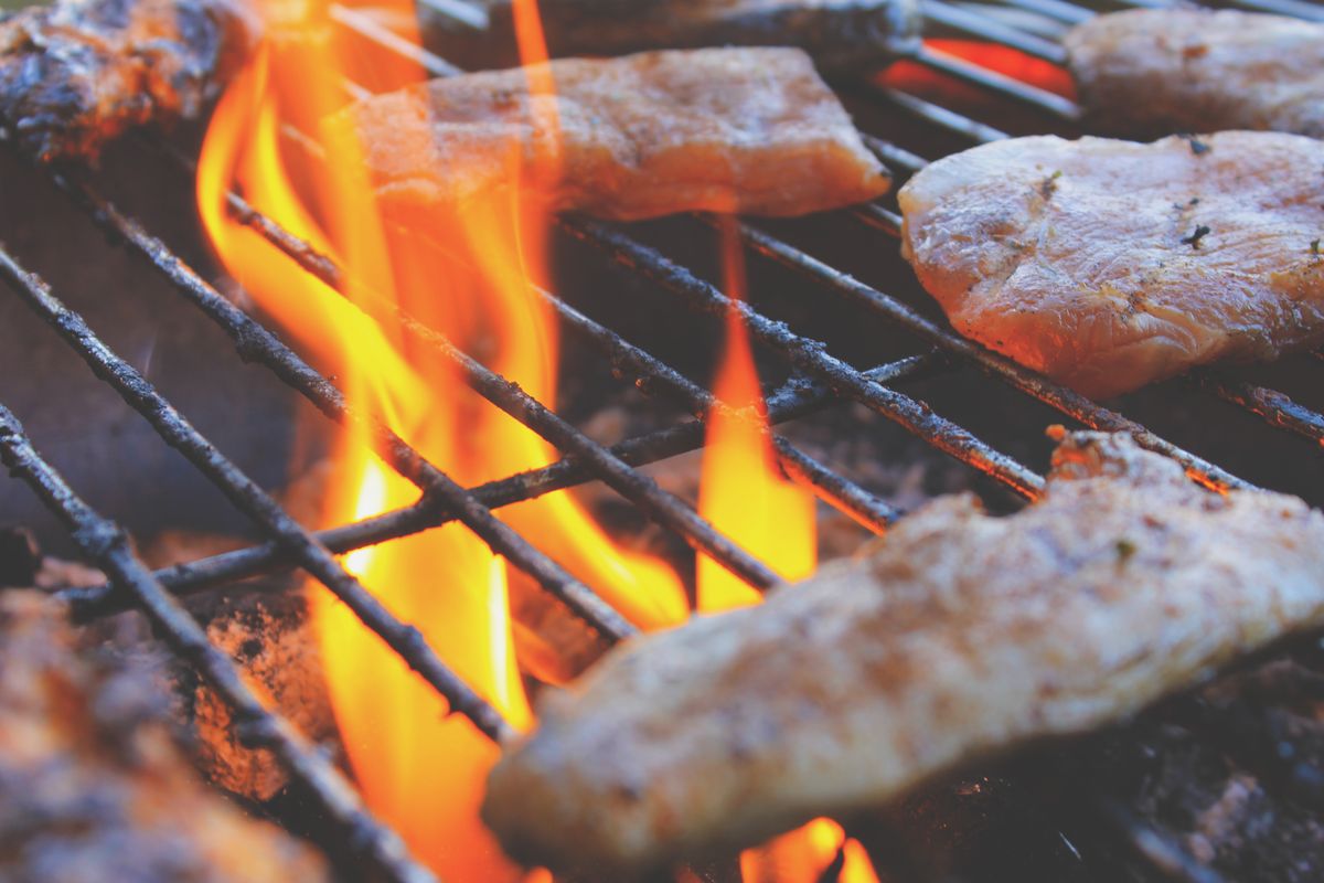 Meat over open flame